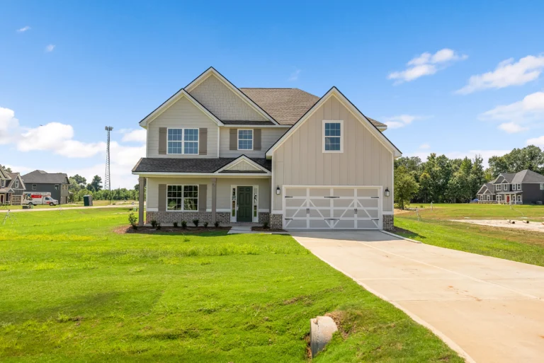 Front exterior of the Cannaberra plan at 31 Heartland Boulevard, Fort Mitchell, AL